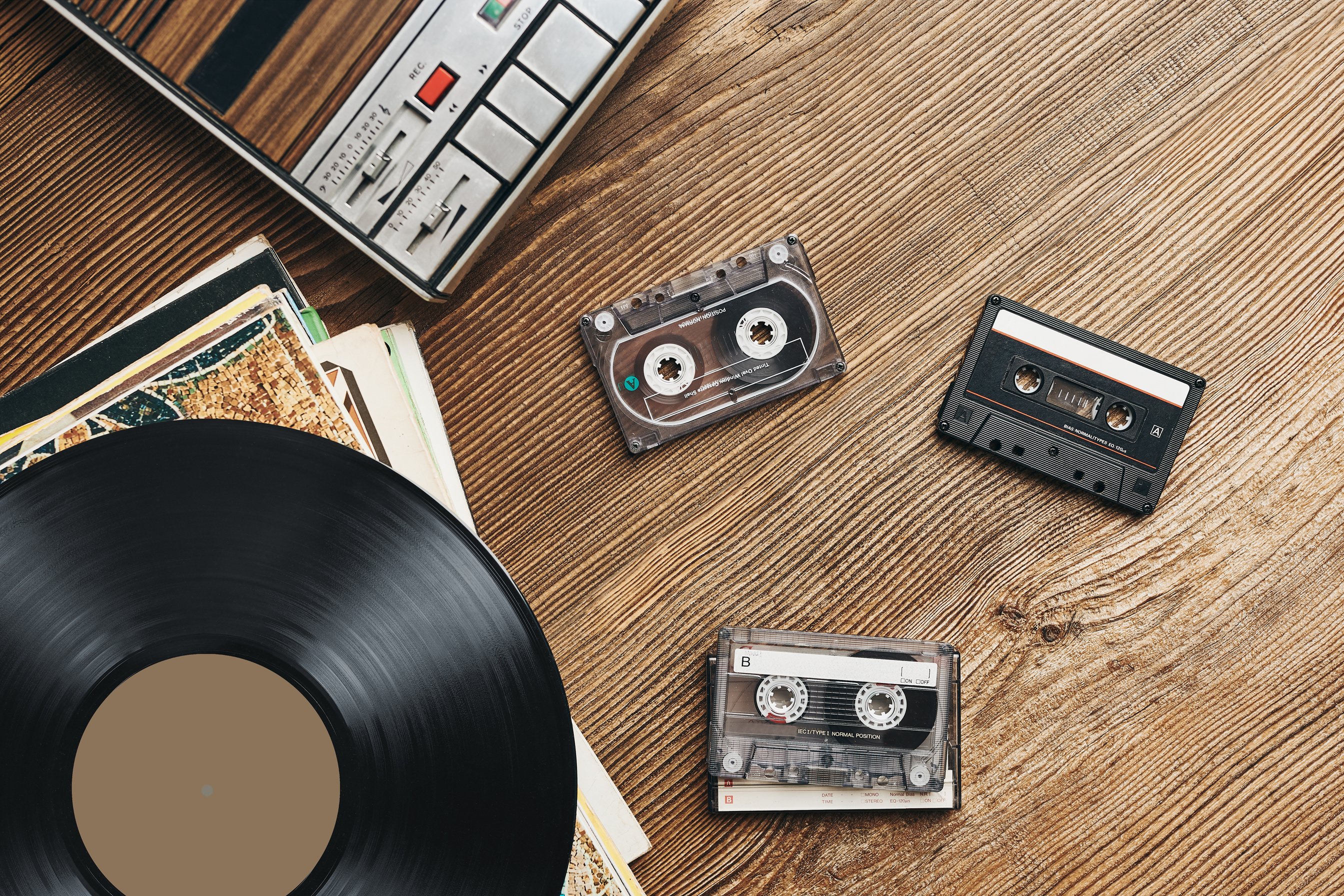 Vinyl Records, Cassette Tapes and Cassette Recorder. Retro Music